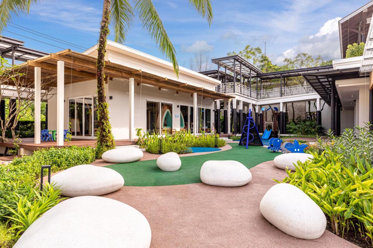 Outrigger Khao Lak Beach Resort - Sha Extra Plus Exterior foto The school's campus